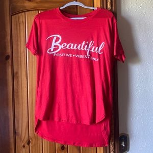 Red and white tShirt by the brand on fire